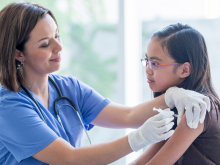 A child getting a vaccination